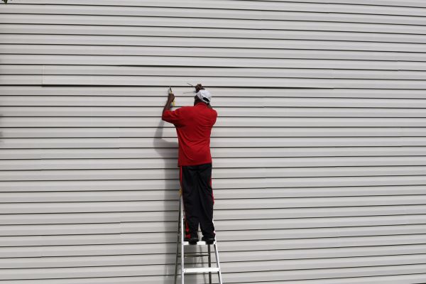 Loose Siding Repair in Overland Park
