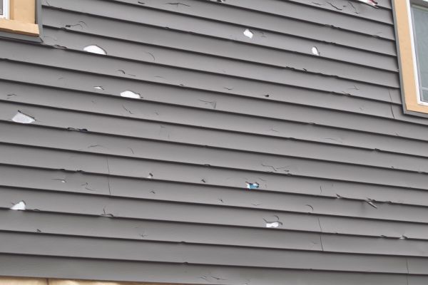 Damaged Siding Replacement in Overland Park