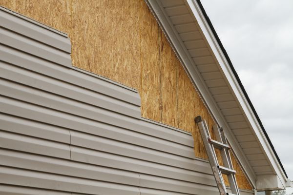 Grey Vinyl Siding Installation in Overland Park